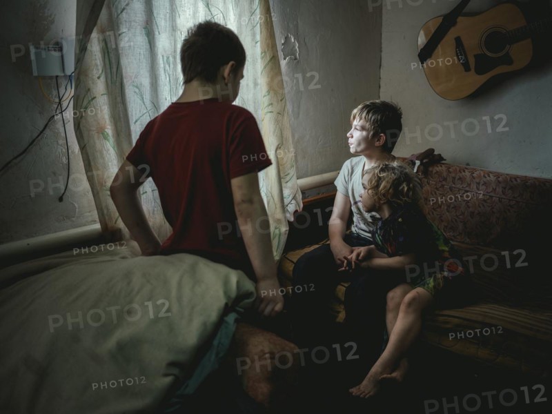 Sasha, 9 years old, Dima, 12 years old and Nastya, 5 years old. They live in the village of Borshchivka, which was occupied by the Russian army for over six months. They suffer from anxiety disorders, the front is only a few kilometres away as the crow flies, Borshchivka, Raion Isyum, Kharkiv Oblast, Ukraine, Europe