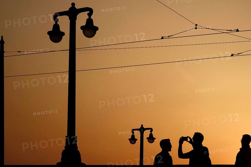 Tourists on the Augustus Bridge in Dresden, sunset, Saxony, Germany, Europe