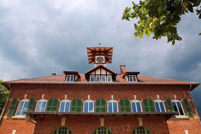 Royal post office, brick building, clock, green shutters, Albgut, old camp, former military area, biosphere area, Münsingen, Swabian Alb, Baden-Württemberg, Germany, Europe