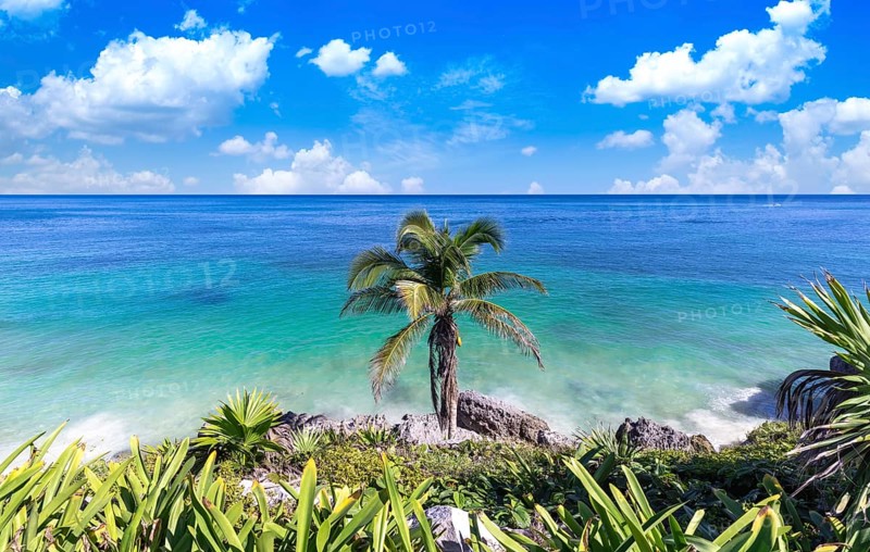 Mexico, Tulum Archaeological Zone and Mayan pyramids on scenic ocean shore, Central America