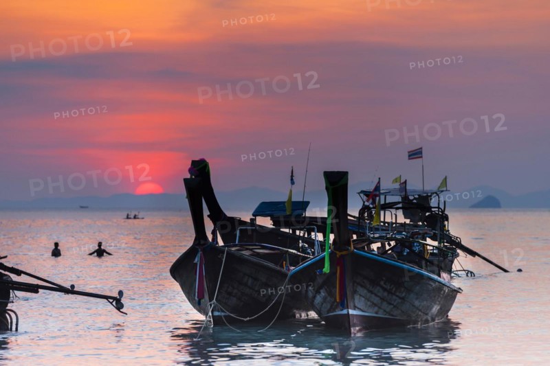 Longtail boat at sunset at Railay beach, evening mood, sun, evening, boat, sea, seascape, cloud, red sun, romantic, ocean, nature, beach holiday, beach holiday, travel, holiday, tourism, calm, chilly, bay, bathing bay, paradise, paradisiacal, exotic, heat, warm, climate, tropical, tropical, seascape, evening sky, silhouette, dusk, swimming, bathing, sky, Krabi, Thailand, Asia