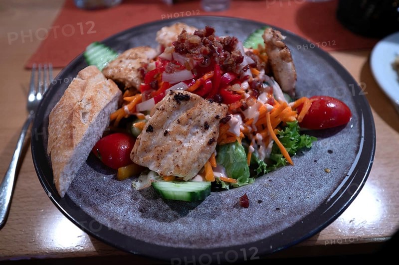 Salad with roasted turkey strips served in a restaurant, Bavaria, Germany, Europe