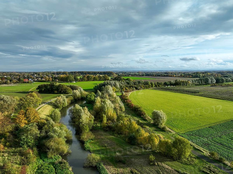 Bergkamen, Ruhr area, North Rhine-Westphalia, Germany, autumn landscape on the Seseke. The renaturalised Seseke, a tributary of the Lippe, has been transformed into a near-natural watercourse, flood protection and biodiversity through newly designed floodplains. Following the construction of a parallel sewer, the Seseke is now free of wastewater, having previously been an open, above-ground wastewater sewer, combined sewer with surface water and wastewater. Theme photo: EU Nature Conservation Act. The EU Nature Conservation Act obliges member states to implement measures to restore nature on at least 20 per cent of the EU's land and sea areas by 2030, Europe