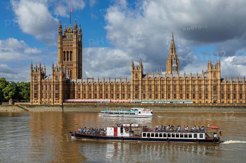 Excursion boats on the Thames at the Houses of Parliament, London, England, Great Britain