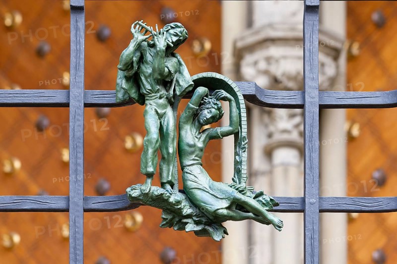 Prague castle, Gothic Metropolitan Cathedral of Saints Vitus, Wenceslas and Adalbert, Decorative figure of daily life scene on a fence, Prague, Czech Republic, Europe