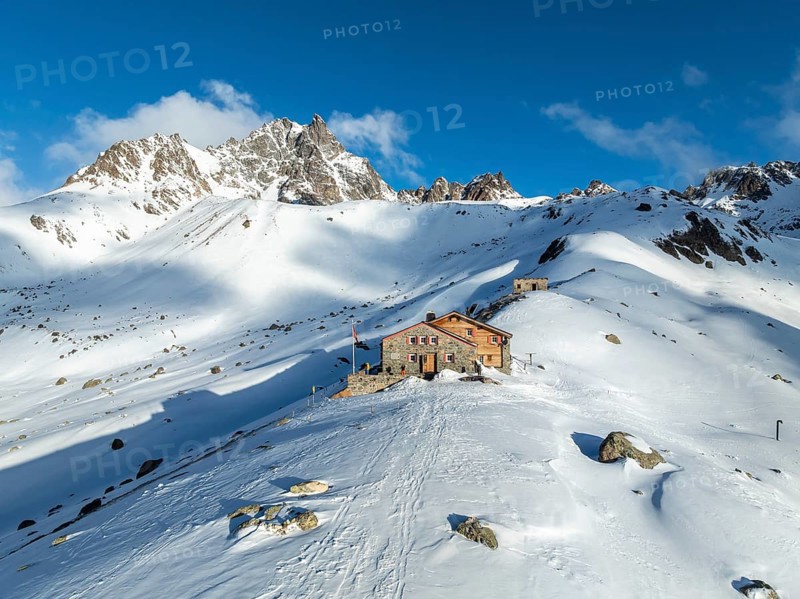 SAC Alpine Club hut in winter, Chamanna d'Es-cha, Pitz Blaisun, Albula Alps, Grisons, Switzerland, Europe