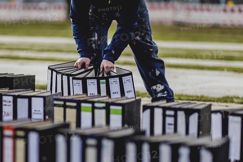 Files are cleared away after a protest action by the German Confederation of Skilled Crafts in front of the Federal Chancellery in Berlin, 26 February 2024. The German Confederation of Skilled Crafts demonstrates against the economic policy of the federal government as well as the high level of bureaucracy and the improvement of location conditions