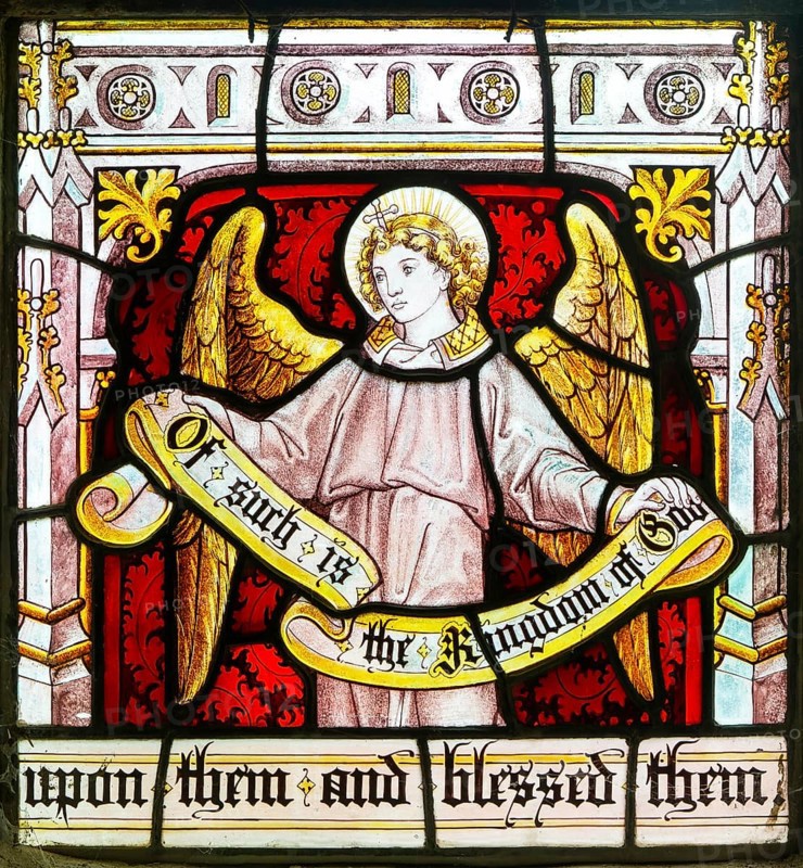 Detail of angel on stained glass window 'Suffer the Little Children' by Burlison & Grylls c 1880, Kelsale church, Suffolk, England, UK