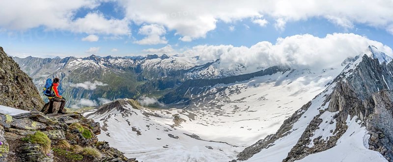 Panorama, mountaineer at the Schönbichler Scharte, view of mountain landscape with snow and glacier Waxeggkees, summit Großer Möseler, Berliner Höhenweg, Zillertal Alps, Tyrol, Austria, Europe