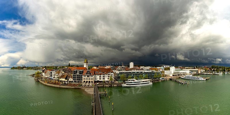 Panorama from the Moleturm tower onto the lakeside promenade of Friedrichshafen on Lake Constance as a thunderstorm approaches, Upper Swabia, Baden-Württemberg, Germany, Europe