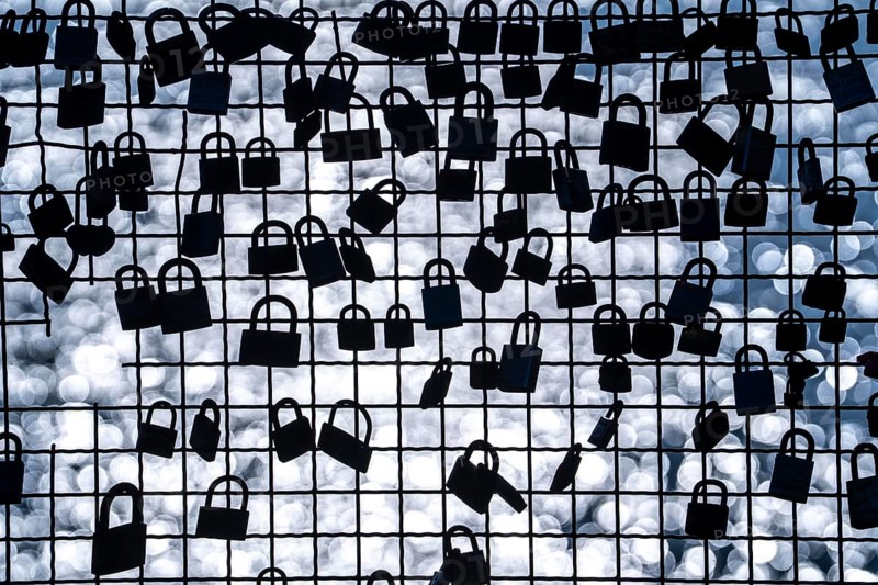 Padlocks, so-called love locks on a fence, vantage point in Wesel am Rhein, North Rhine-Westphalia, Germany, Europe