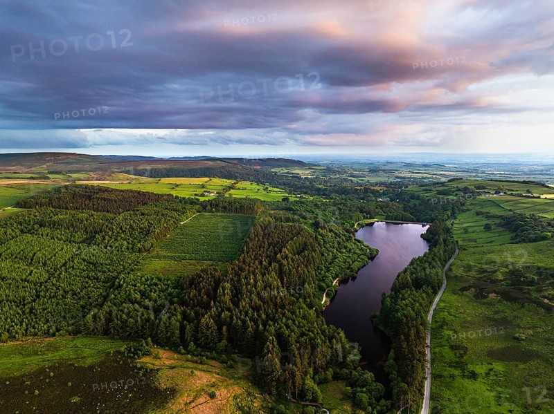 Sunset over Cod Beck Reservoir from a drone, North York Moors National Park, North Yorkshire, England, United Kingdom, Europe