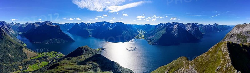 Panoramic aerial view of the Hjørundfjord, from inner fjord to the open sea, Norway, Europe