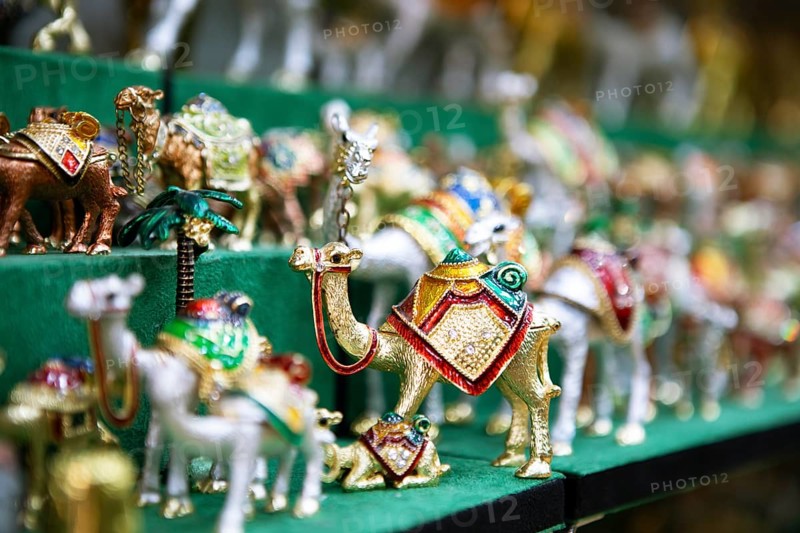 Souvenir camels in the souk or soug or market in the old town of Nizwa, ad-Dachiliyya region, Oman, Asia