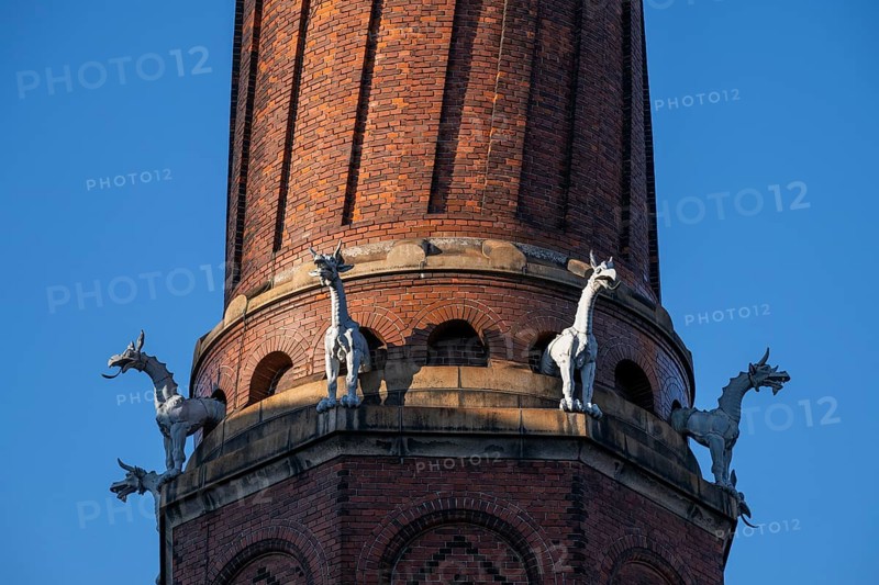 Detail, coiled industrial chimney by Carl Jacobsen, Vilhelm Dahlerup and PS Beckmann with replicas of the chimeras or gargoyle sculptures from Notre-Dame, Carlsberg district, Copenhagen, Denmark, Europe
