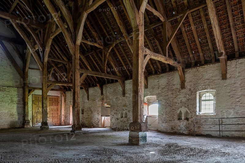 Interior showing wooden truss of 13th century Gothic monastic tithe barn of the Ter Doest Abbey at Lissewege near Bruges, West Flanders, Belgium, Europe