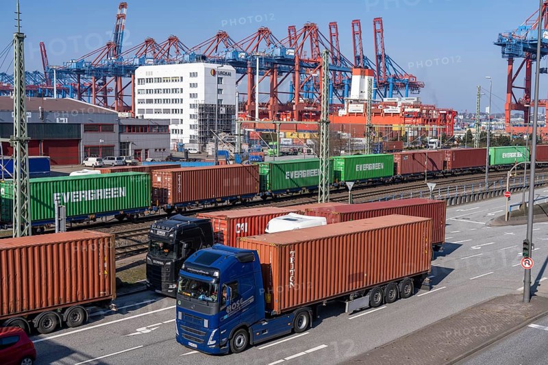 Port of Hamburg, Waltershofer Hafen, container ships, goods train with containers and container lorries bring and collect freight containers to and from HHLA Container Terminal Burchardkai, Hamburg, Germany, Europe