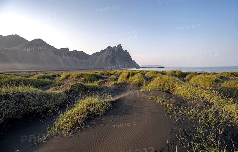 Black beach with volcanic sand, sandy beach, dunes with grass, Stokksnes headland, Klifatindur mountain range, Austurland, East Iceland, Iceland, Europe