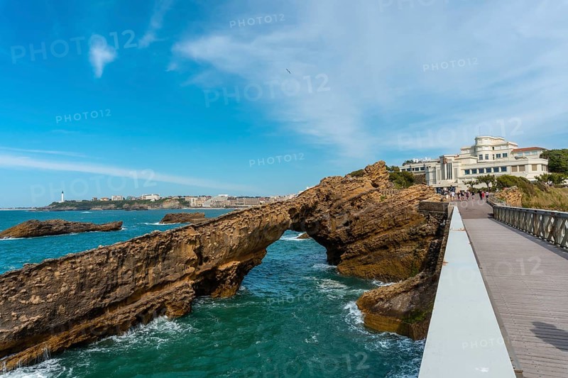Wooden bridge together to Plage du Port Vieux in Biarritz, holiday in south-eastern France. Biarritz, department of Pyrenees-Atlantiques