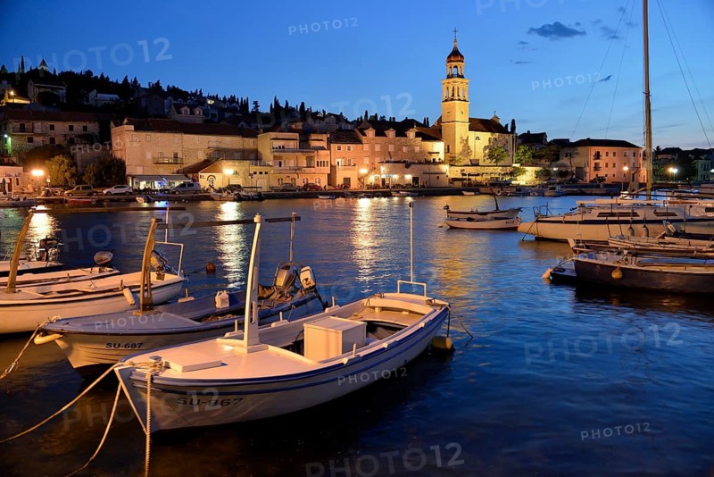 Fishing boats in the harbour of Sutivan front of the Sveti Ivan Church, Sutivan, Island Brac, Dalmatia, Croatia, Europe