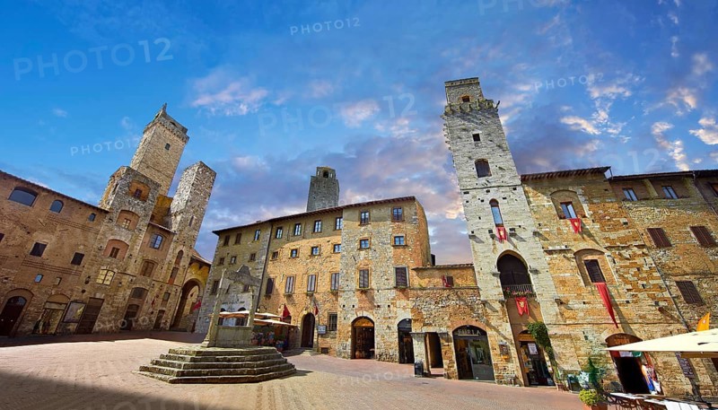 Medieval buildings of Piazza della Cisterna, San Gimignano, Tuscany Italy