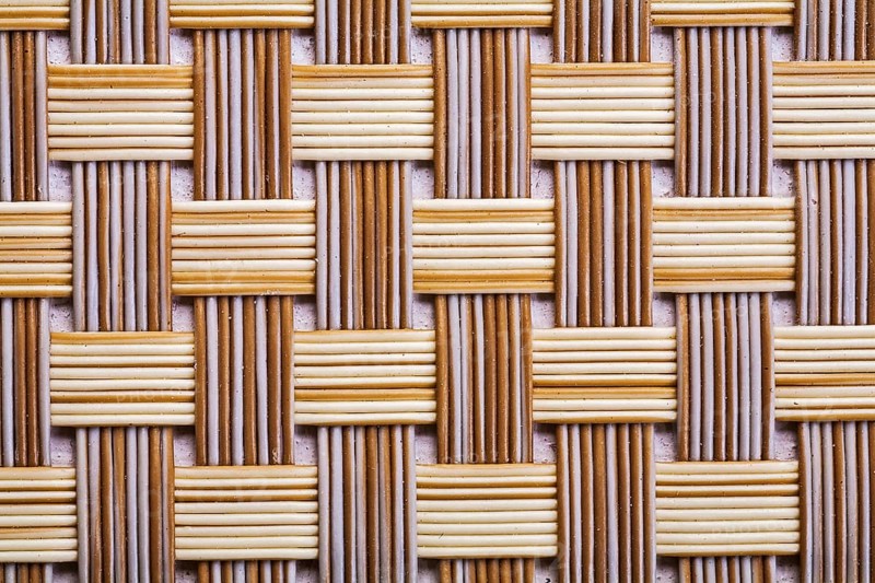 Plastic wicker woven texture background very close up