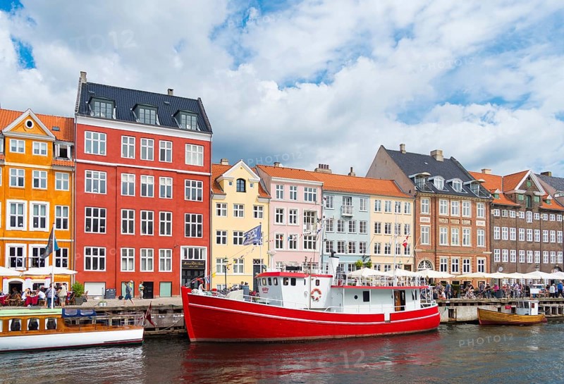 COPENHAGEN, DENMARK, JULY 31, 2016: Summer view of the famous Nyhavn with its colorful buildings