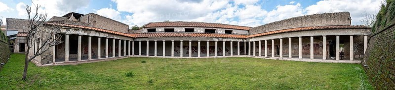 OPLONTIS, ITALY, MAY 03, 2022, Garden and colonnade of the ancient Roman Villa Oplontis near Pompeii, Southern Italy