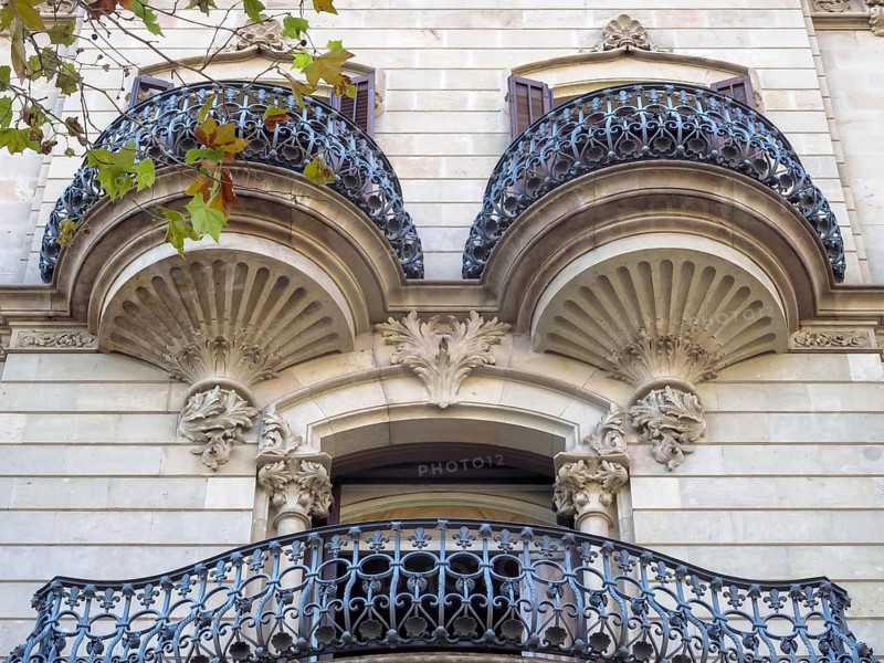 Beautifully shaped balconies on the modernist facade of a residential building, Barcelona, Catalonia, Spain, Europe
