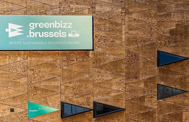 Belgium, 02 25 2019: Wooden brick wall with triangle pattern of the Greenbizz Brussels company, Europe