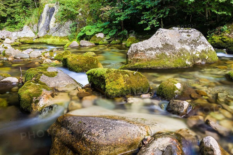 Creek and little waterfall in the Ligurian Alps, during summer season