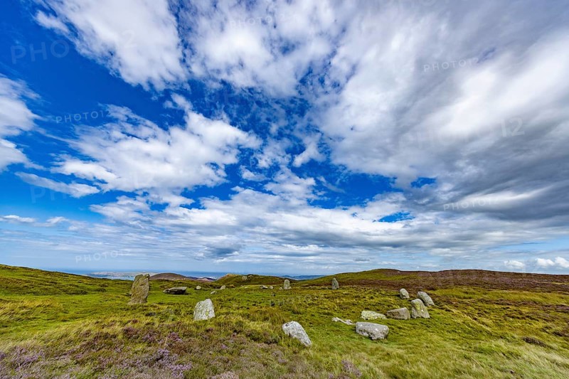 Druids Circle, stone circle in wide landscape with pastures in the mountains, Penmaenmawr, Dwygyfylchi, Caernarfonshire, Conwy County Borough, Wales, Great Britain