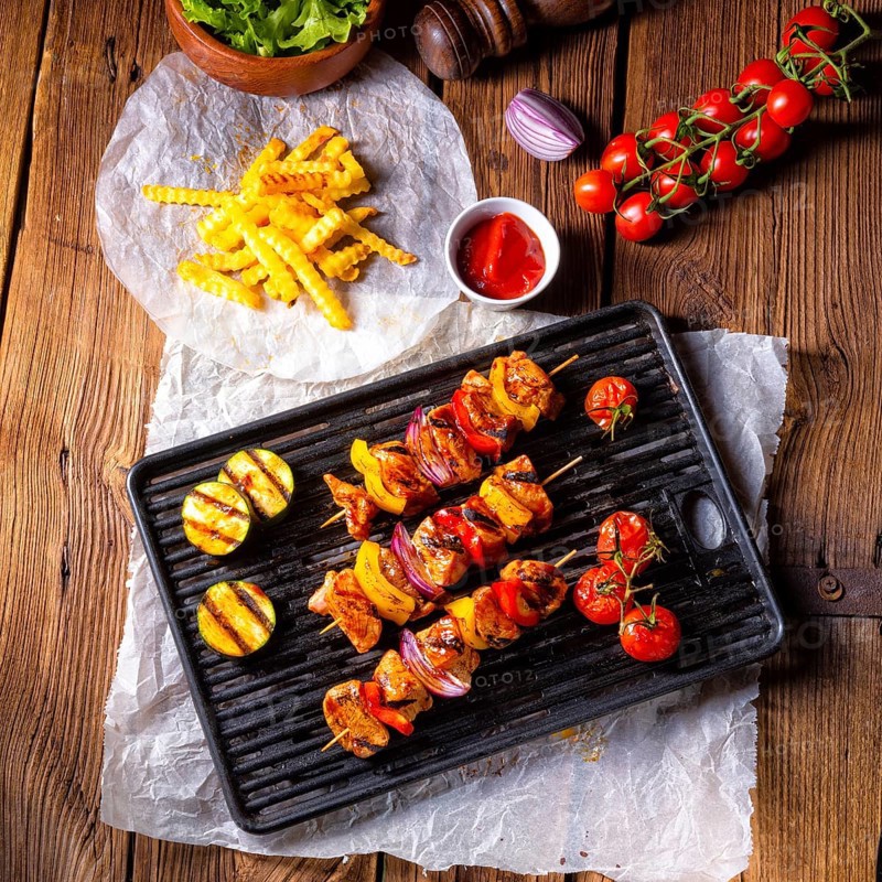 Rustic shish kebab skewers with marinated ham meat paprika and red onion