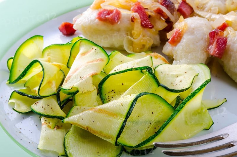 Silesian dumplings with Bacon and zucchini