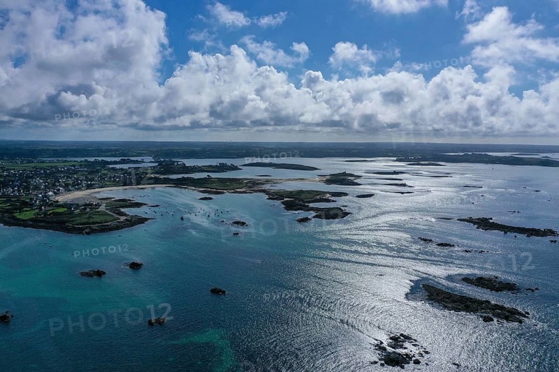 Aerial view of the coast of Plouguerneau with offshore islands at the mouth of the English Channel into the Atlantic Ocean, Leon, Finistere Penn-ar-Bed department, Bretagne Breizh region, France, Europe