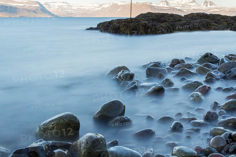Time exposure of stones in the Westfjords coast, Iceland, Europe