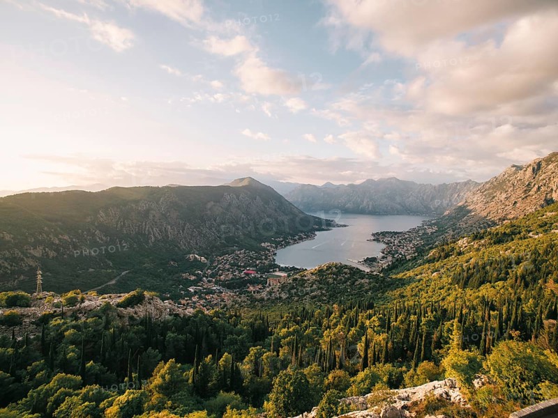 View of the valley of the Bay of Kotor surrounded by a high mountain range. Montenegro. Drone.