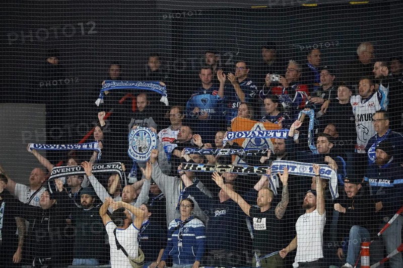 The travelling Ingolstadt fans celebrate the 6:3 victory in Schwenningen after the game of the DEL 24-25, Sptg. 5: Schwenninger Wild Wings vs ERC Ingolstadt, Villingen-Schwenningen, Germany / Germany