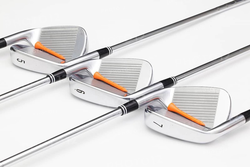 Titanium golf clubs on the white background