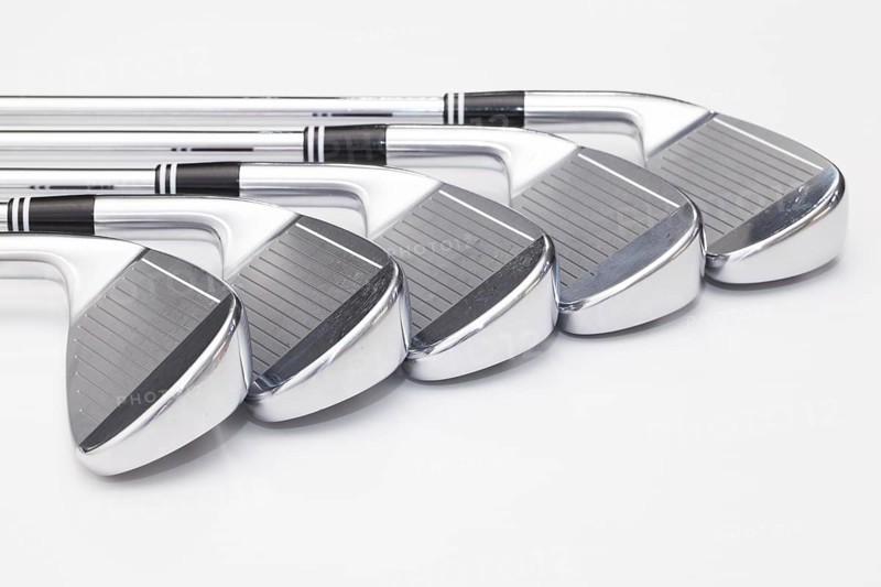 Titanium golf clubs on the white background