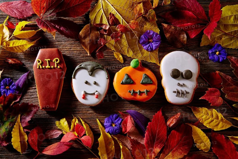 Halloween sweets biscuits pumpkin skull vampire and tomb shapes