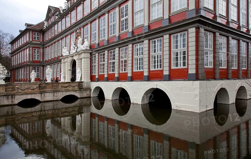 Wolfenbüttel Castle Portal façade partial view with moat and castle bridge present appearance 1714-17 by Hermann Korb Sculpture by Franz Finck