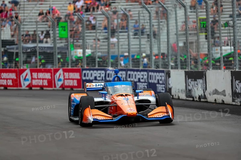 SCOTT DIXON (9) of Auckland, New Zealand runs through the streets during the Honda Indy Toronto in Toronto, ON, CAN