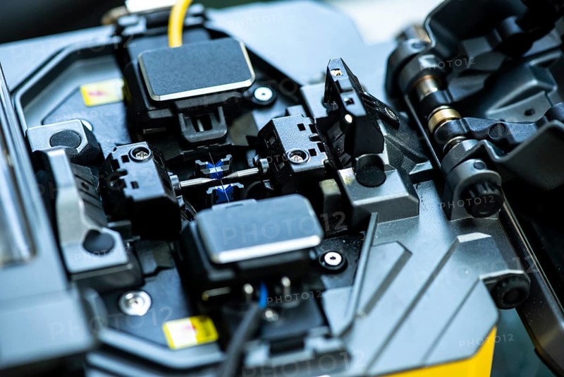 Device for mounting optical cable. Optical internet Technology concept. Optical fiber assembly