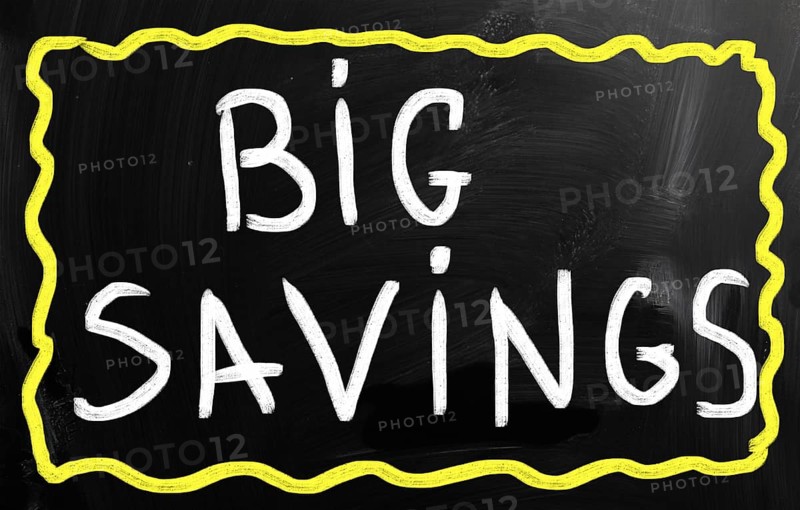 Big savings handwritten with white chalk on a blackboard
