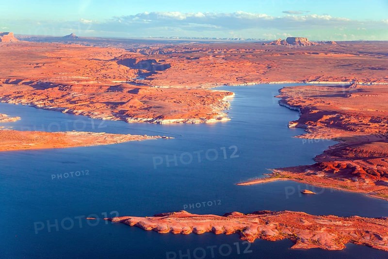 Lake Powell is a reservoir on the Colorado River. States of Utah and Arizona. USA. Huge lake of artificial origin among the red sandstone cliffs. The photos were taken from the plane