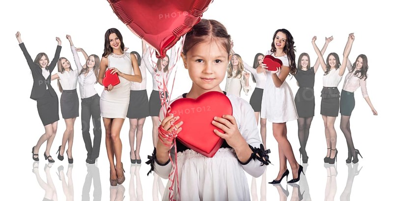Beautiful girl in dress giving box heart isolated on white