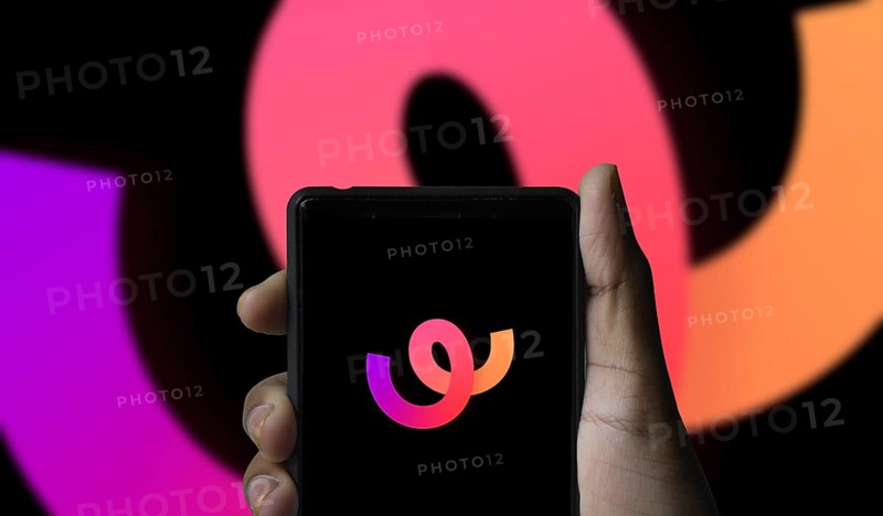 Whee logo is displayed on smartphone. Whee is a new social app owned by ByteDance, TikTok Pte. Ltd.