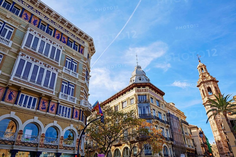 Valencia Casa Isla de Cuba and Santa Catalina tower church in La Paz street of Spain
