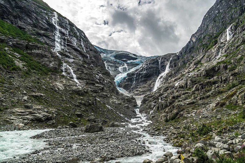 The Kjenndalsbreen is part of the Jostedalsbreen, one of the largest glaciers in Norway, and forms an impressive mountain landscape. The glacier Kjenndalsbreen in Norway is a beautiful place to travel to in summertime